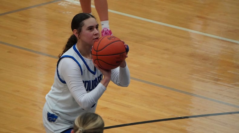 Cincinnati Christian’s Kaylin Davis eyes a free-three attempt during her game against Middletown Christian on Monday night at CCS. CHRIS VOGT / CONTRIBUTED