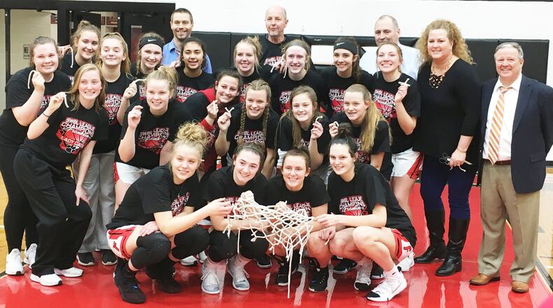 Franklin’s girls basketball team poses for a photo Monday night after defeating Valley View 55-45 at Darrell Hedric Gym in Franklin. The Wildcats won the Southwestern Buckeye League Southwestern Division title this season. RICK CASSANO/STAFF