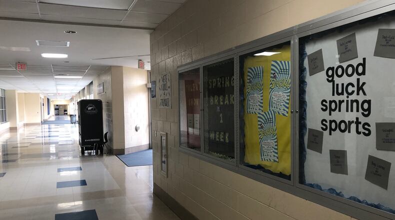 The hallways at Fairmont High School in Kettering are empty March 24, 2020., due to the coronavirus pandemic. Ohio Gov. Mike DeWine on Monday, March 30, ordered schools closed even longer, at least through May 1. JEREMY P. KELLEY / STAFF