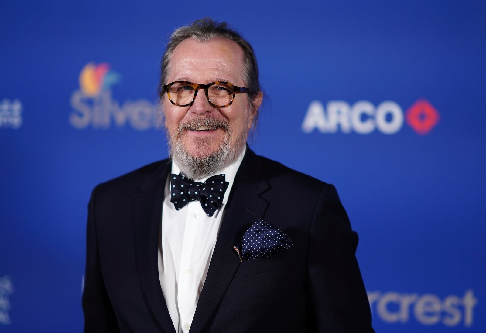FILE - Gary Oldman poses in the press room during the 36th annual Palm Springs International Film Festival Awards Gala on Friday, Jan. 3, 2025, in Palm Springs, Calif. (Photo by Jordan Strauss/Invision/AP, file)