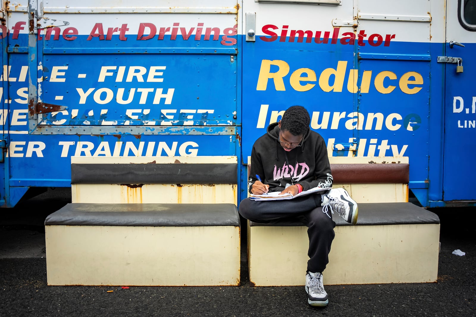Solane Ellis studies at the Driving Academy on Tuesday, June 10, 2025 in Linden, N.J., where students prepare to obtain a Commercial Driver’s License (CDL) with multilingual instructors. (AP Photo/Angelina Katsanis)