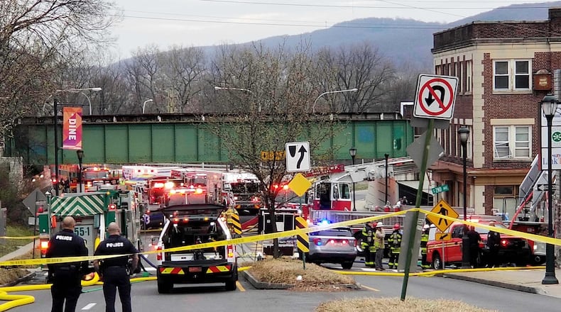 FILE - Emergency personnel work at the site of a deadly explosion at a chocolate factory in West Reading, Pa., on March 25, 2023. (Michelle Lynch/Reading Eagle via AP, File)