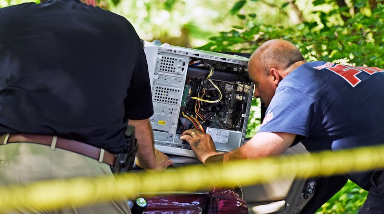 Middletown police and fire departments investigate a fire last September in the 1900 block of Court Donegal that caused about $400,000 in damages. Police and firefighters took 56 hours of training a little more than a year ago to investigate suspicious fires and formed the Middletown Fire Investigation Task Force. NICK GRAHAM/STAFF