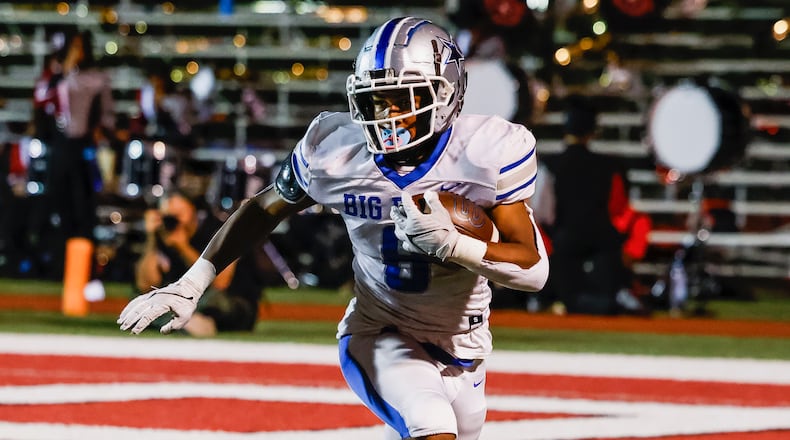 Hamilton's Cournell Bennett-McCoy carries the ball during their football game Friday, Sept. 15, 2023 at Princeton. Princeton won 22-16. NICK GRAHAM/STAFF
