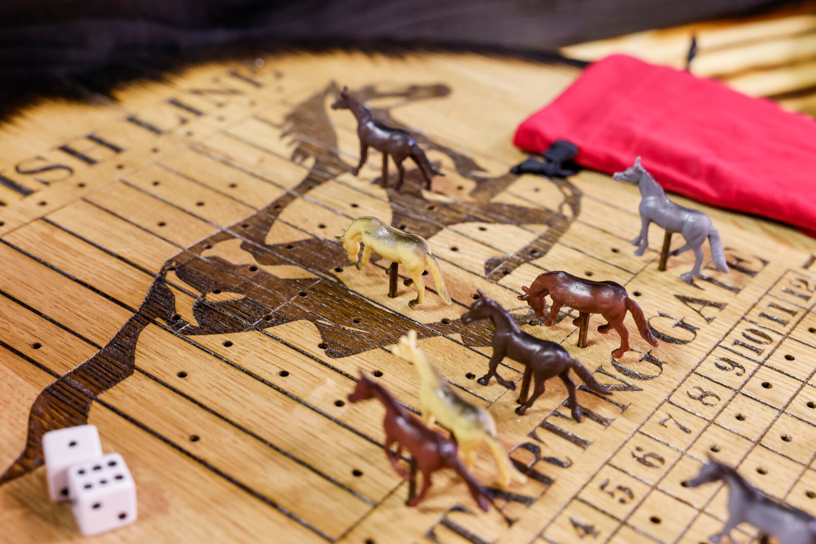 Bourbon and Fire will open their new storefront Wednesday, June 28 on Main Street in Hamilton. The store features custom laser engraved bourbon barrel lid games and decor, mixers, cigars and more. The back of the shop has a curated clothing boutique. NICK GRAHAM/STAFF