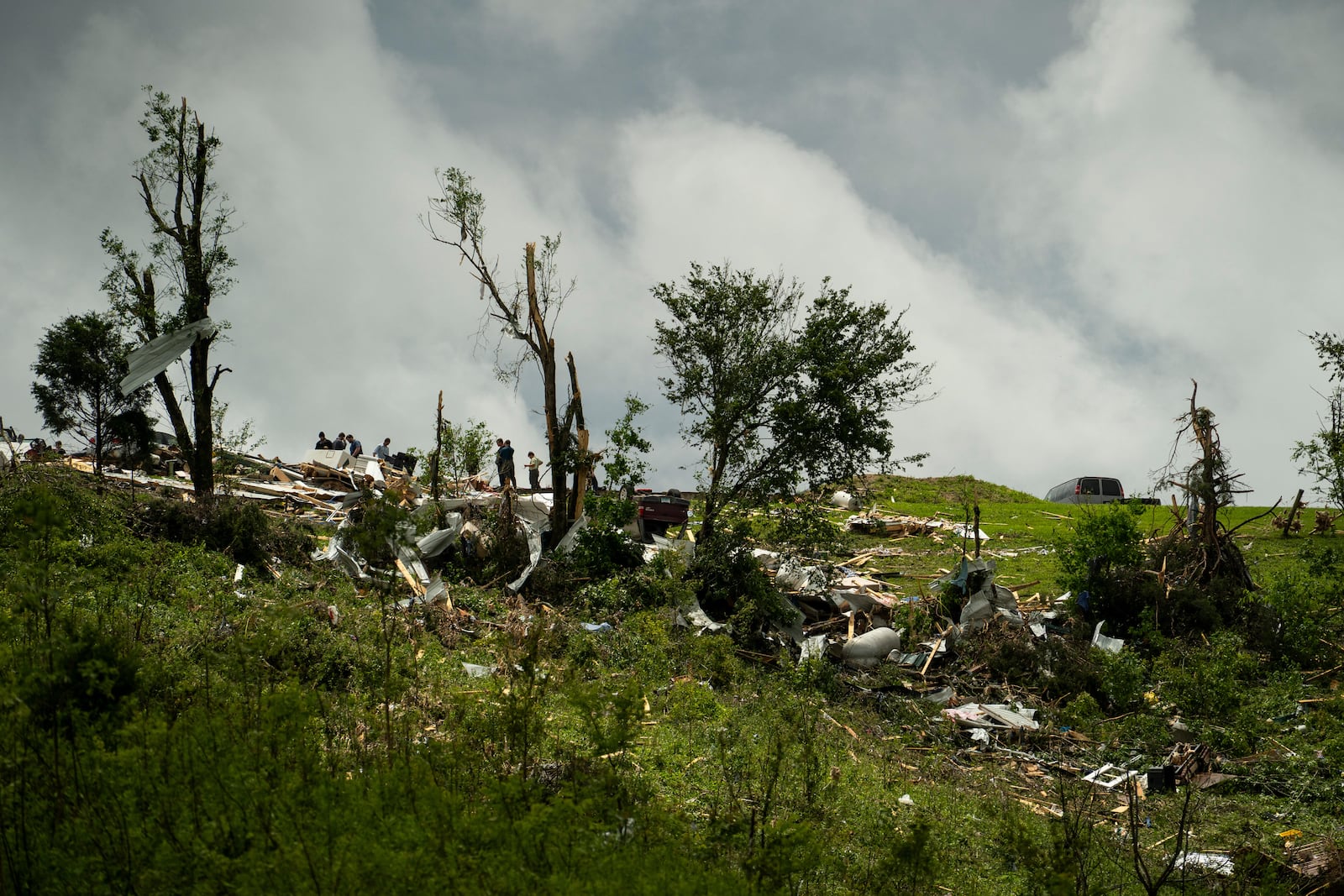 Debris and heavy damage are seen from severe weather, Friday, May 30, 2025, in Springfield, Ky. (AP Photo/Michael Swensen)