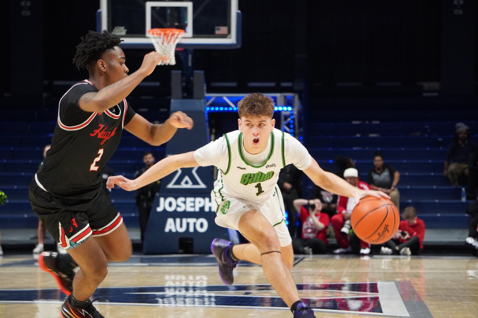 Badin's Eli Stroud drives the lane during his Division III regional semifinal game against Hughes on Tuesday night at Xavier University's Cintas Center. CHRIS VOGT / CONTRIBUTED