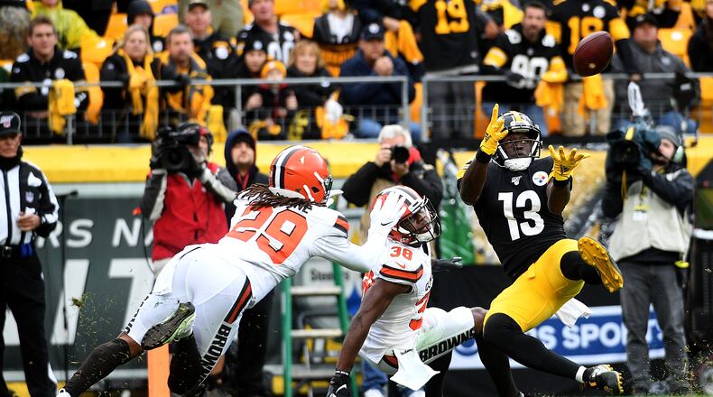 PITTSBURGH, PA - DECEMBER 01: James Washington #13 of the Pittsburgh Steelers makes a catch in front of Sheldrick Redwine #29 of the Cleveland Browns for a 30-yard touchdown reception in the second quarter at Heinz Field on December 1, 2019 in Pittsburgh, Pennsylvania. (Photo by Justin Berl/Getty Images)