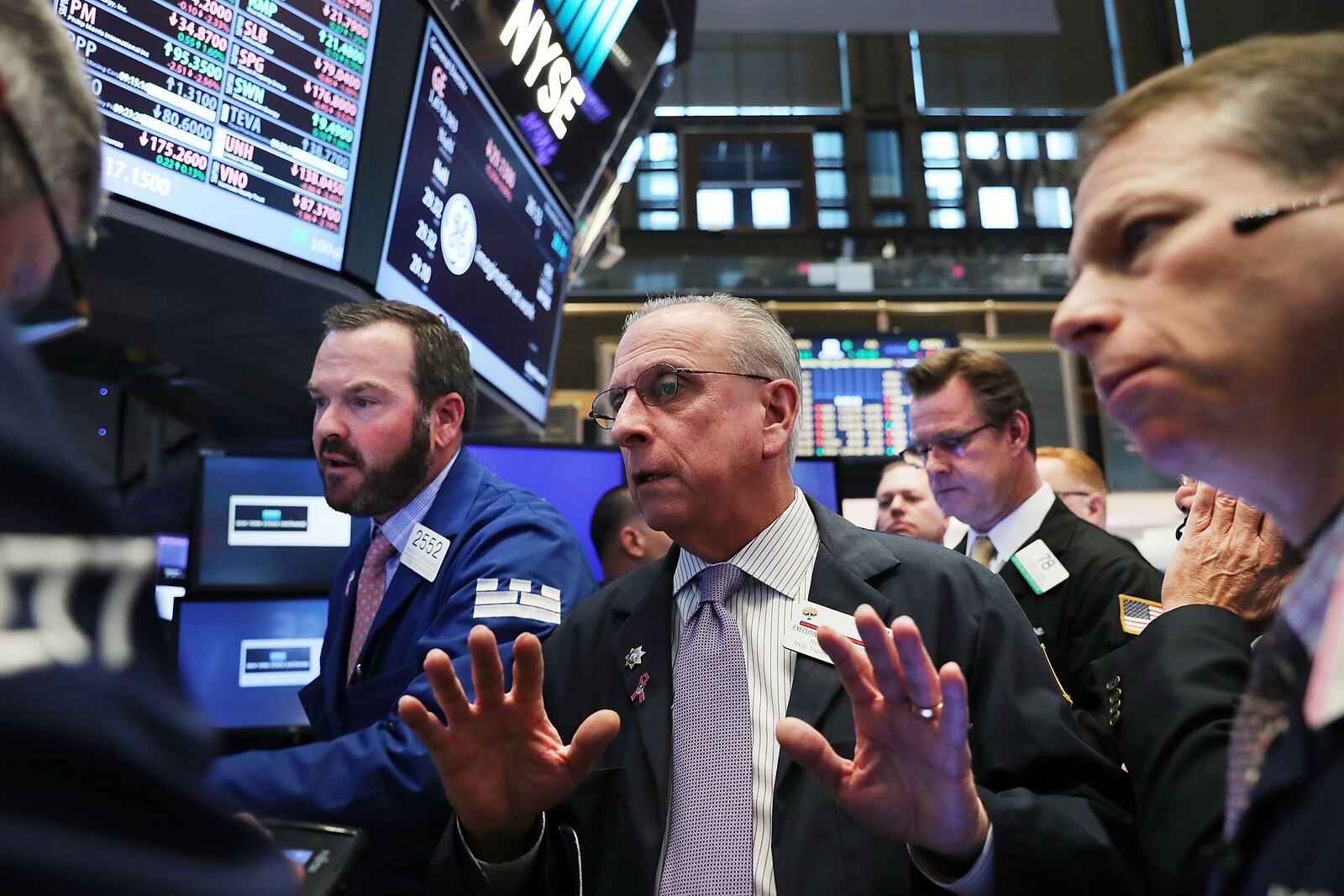 Traders work on the floor of the New York Stock Exchange the morning after Donald Trump won a major upset in the presidential election on November 9, 2016 in New York City. Global markets initially dropped after it became clear Trump would win the election before all the major U.S. stock indices rallied to new highs just before Christmas. (Photo by Spencer Platt/Getty Images)