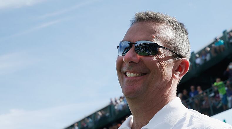 SCOTTSDALE, AZ - JANUARY 28: Urban Meyer, head football coach at Ohio State University, looks up to the gallery on the 16th hole during the pro-am prior to the start of the Waste Management Phoenix Open at TPC Scottsdale on January 28, 2015 in Scottsdale, Arizona. (Photo by Scott Halleran/Getty Images)