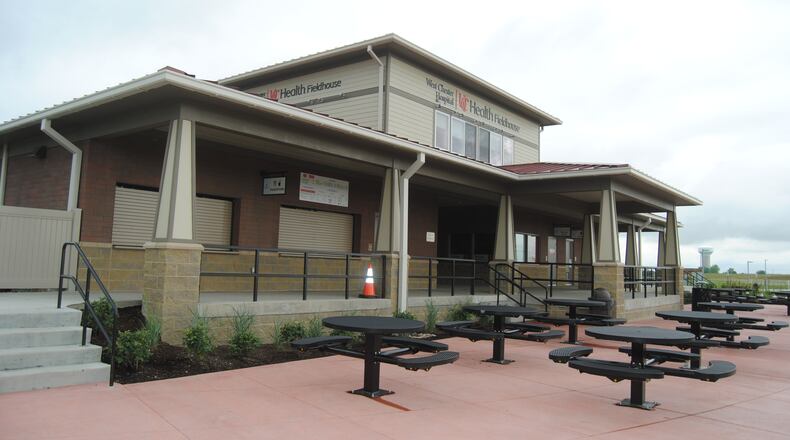 The new UC Health-West Chester Hospital Fieldhouse at Voice of America Athletic Field Complex provides a concession area, restrooms, a trainer’s room and second floor press box just to the west of the center nine fields within the Athletic Complex for enhanced viewing and scouting. It also includes a trainer s room and trainers provided during tournaments. ERIC SCHWARTZBERG/STAFF