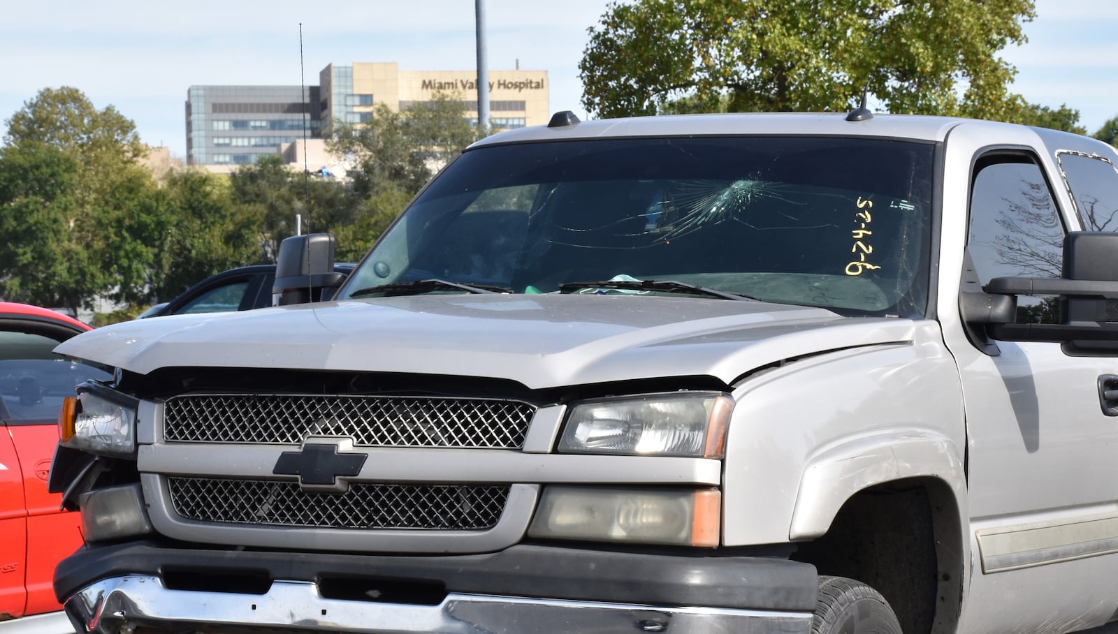 A Chevy with front end damage parked in the Dayton area. CORNELIUS FROLIK / STAFF