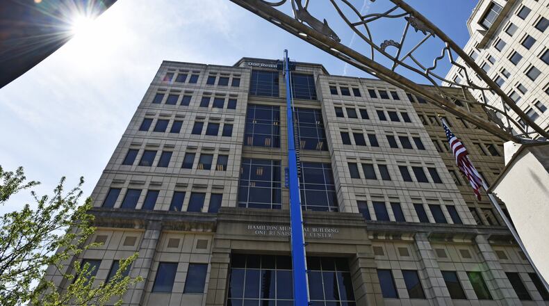 Hamilton officials are considering selling the city-government tower at 345 High St. as a way to raise money for the Spooky Nook at Champion Mill indoor sports complex and other projects. NICK GRAHAM/STAFF