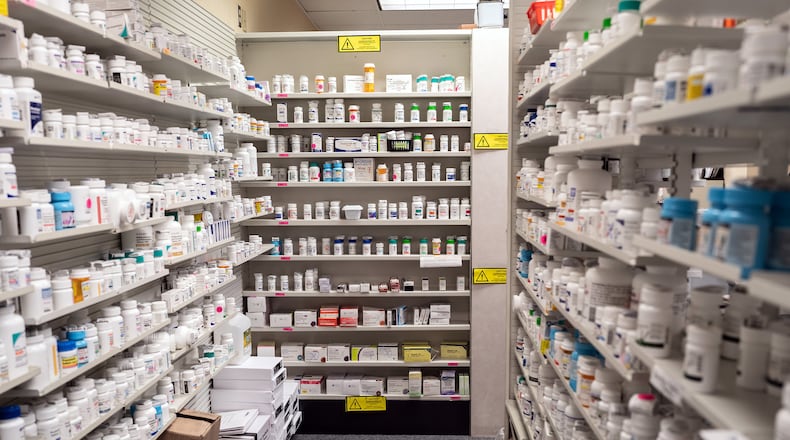 FILE — Prescription drugs in a storage area at a pharmacy in Albuquerque, N.M., on May 26, 2021. The Inflation Reduction Act will impose limits on prescription drug spending through Medicare, starting with insulin in 2023 and 10 other drugs in 2026. (Paul Ratje/The New York Times)
