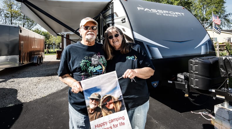 Marty and Donnie Vaughn have bought 8 different campers in 22 years. They are planning to camp at every state park in Ohio. JIM NOELKER/STAFF