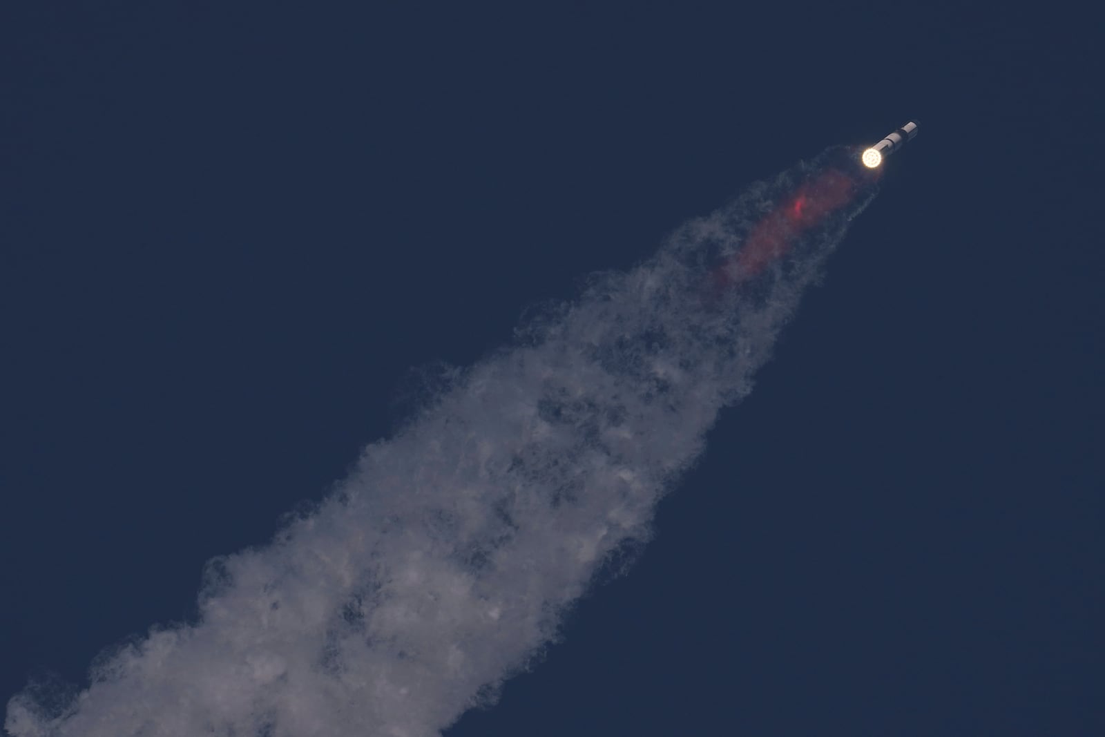 SpaceX's mega rocket Starship makes a test flight from Starbase, Texas, Tuesday, May 27, 2025. (AP Photo/Eric Gay)