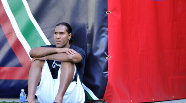 Cincinnati Bengals wide receiver T. J. Houshmandzadeh watches Wayne's game against the East St. Louis Flyers of East St. Louis, Ill., at the Kirk Herbstreit Varsity Football Series at Paul Brown Stadium on Sunday. Wayne defeated East St. Louis 20-12.