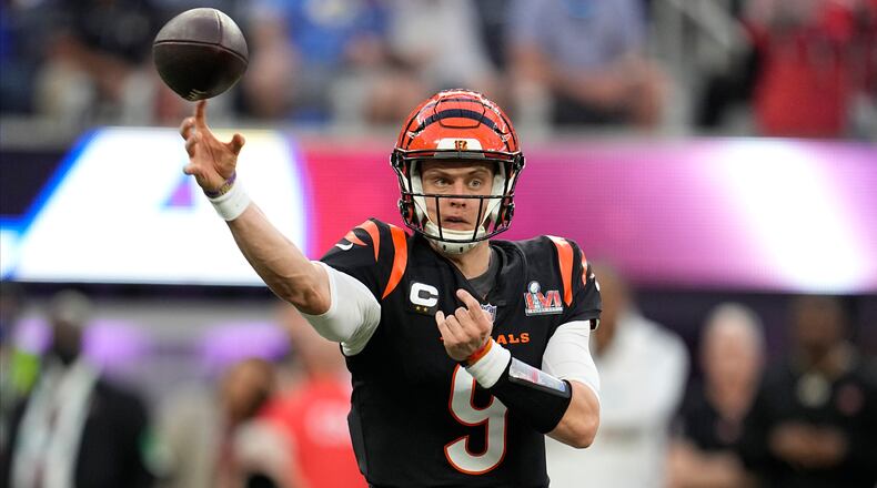 Cincinnati Bengals quarterback Joe Burrow (9) passes against the Los Angeles Rams during the first half of the NFL Super Bowl 56 football game Sunday, Feb. 13, 2022, in Inglewood, Calif. (AP Photo/Marcio Jose Sanchez)