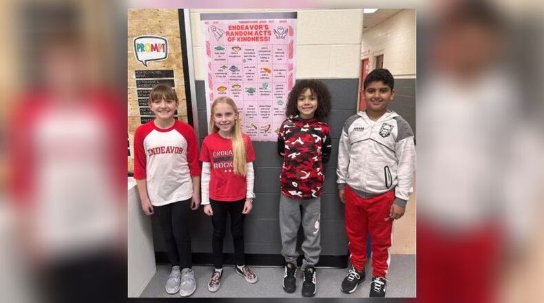 Hundreds of students at this Lakota school are spying and telling on one another, and school leaders couldn’t be happier about it. The game is to catch students doing acts of kindness to their classmates and shine a spotlight on their thoughtfulness. It’s all part of Endeavor Elementary’s “Kindness Month” and pictured are some participating students and one of the posters tallying the good deeds displayed around the school. CONTRIBUTED