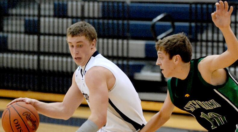 Edgewood’s Nate Thomas brings the ball up court against Little Miami’s Corey Brueggman during a game Jan. 22, 2008, at Edgewood. Thomas will be one of five individuals to be inducted into Edgewood’s Athletic Hall of Fame on Feb. CONTRIBUTED PHOTO BY DAVID A. MOODIE