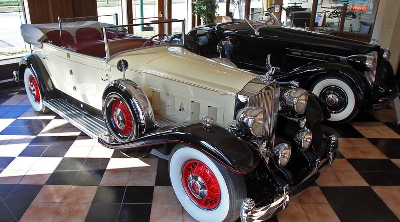 A 1930 Packard Model 734 Boat Tail Speedster sits in the showroom of America's Packard Museum. Offered in five different body styles, only 39 Boat Tail cars were built and it is believed that only 11 survive. Capable of speeds over 100 mph, the 4,250 lb. car cost $5,200.
© Photograph by Skip Peterson
