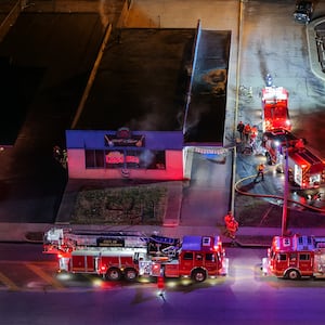 Emergency crews extinguish a fire at Lester's Rock n Roll Shop Tuesday, Jan. 20, 2026 on Central Avenue in Middletown. NICK GRAHAM/STAFF