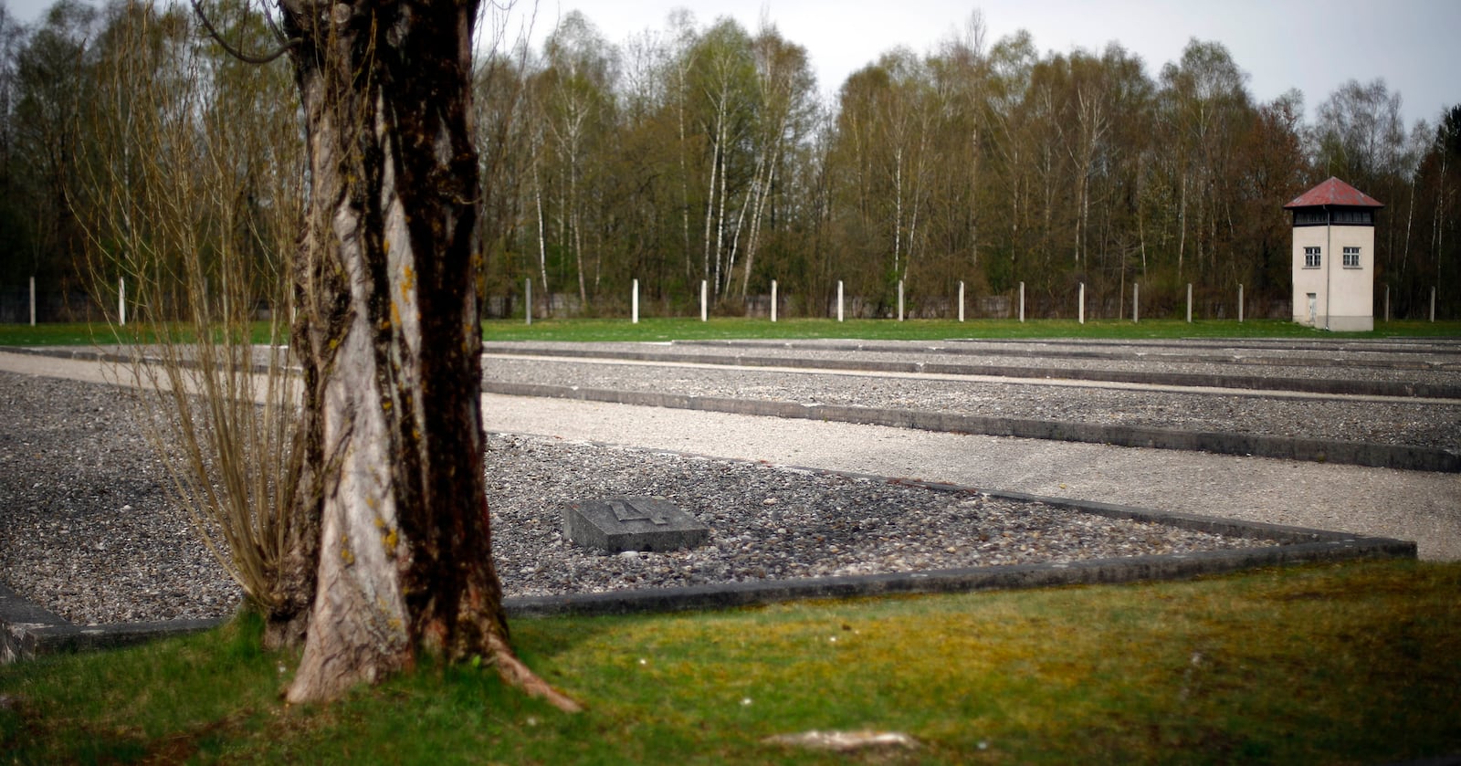 FILE — Stone fields mark the barracks of former concentration camp where more than 43,000 persons were murdered and over 200,000 were imprisoned during the Nazis' terror reign from 1933-1945 in Dachau, Germany, April 16, 2015. (AP Photo/Matthias Schrader, File)