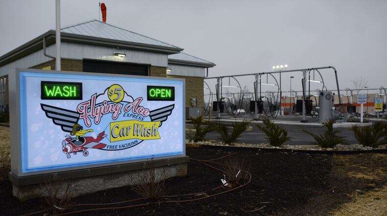 Flying Aces Express Car Wash opened last month in Fairfield Twp., replacing a self-service car wash next to Coffee Cup Overflowing and Home Depot. Pictured is the car wash’s marquee on Jan. 28, 2020. MICHAEL D. PITMAN/STAFF