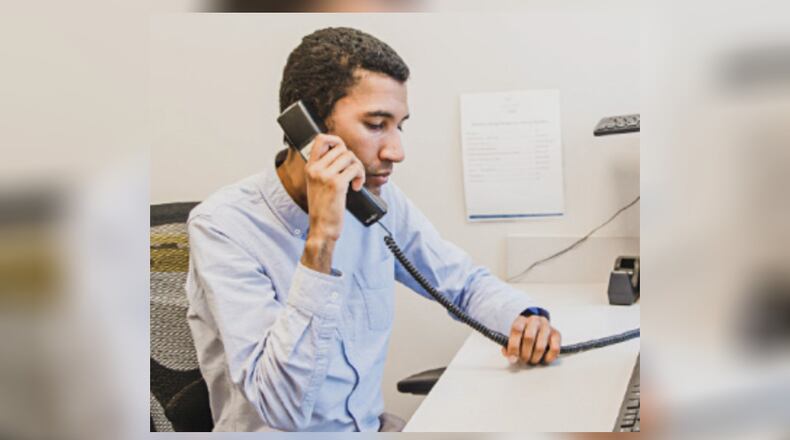 A crisis counselor picks up a 988 call at the Sojourner Recovery crisis call center in Butler County. CONTRIBUTED