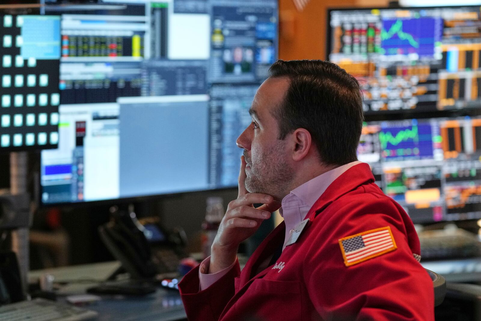 Robert Greason works on the floor at the New York Stock Exchange in New York, Thursday, April 3, 2025. (AP Photo/Seth Wenig)