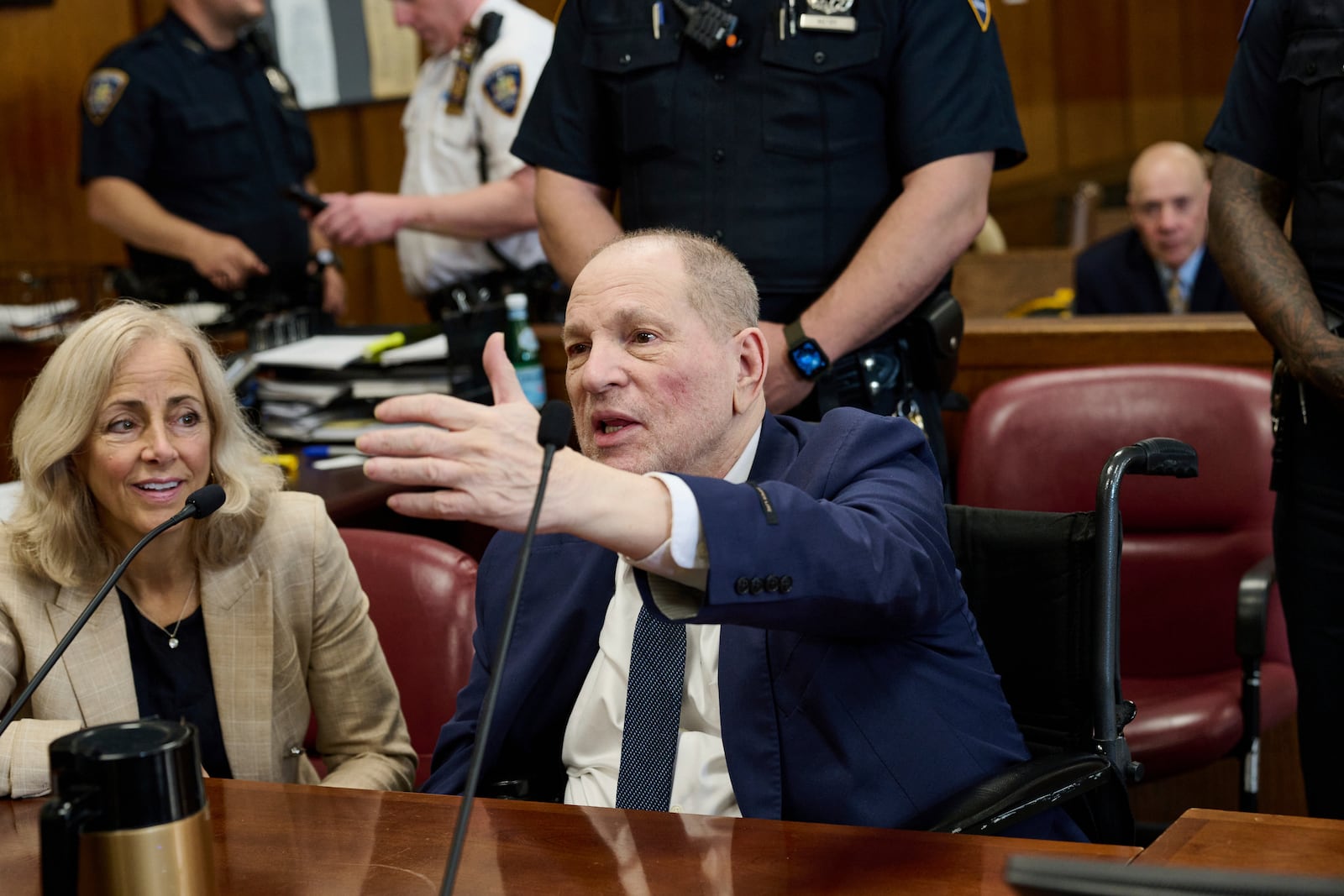 Harvey Weinstein jokes with press photographers in Manhattan criminal court as the jury in his retrial deliberates, Wednesday, June 11, 2025, in New York. Curtis Means/Pool Photo via AP)