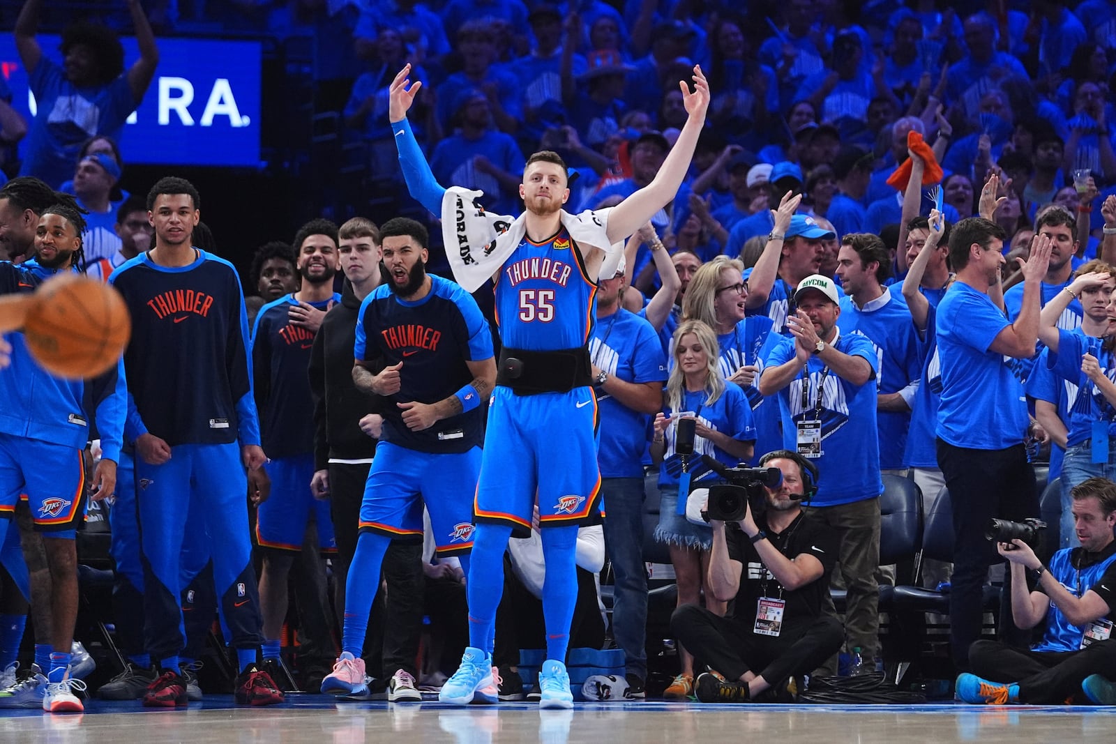 Oklahoma City Thunder center Isaiah Hartenstein (55) reacts after guard Luguentz Dort made a 3-pointer during the second half of Game 7 of the NBA Finals basketball series against the Indiana Pacers Sunday, June 22, 2025, in Oklahoma City. (AP Photo/Julio Cortez)