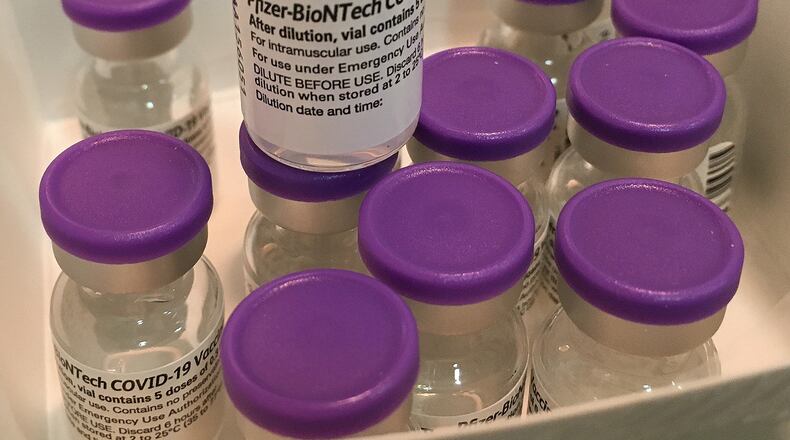 Hundreds of people arrived at the Dayton Convention Center Wednesday morning, Jan. 20, 2021, for the COVID-19 vaccination.