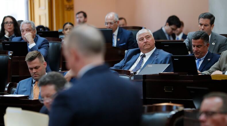 Rep. Brian Steward introduces a resolution to expel Rep. Larry Householder during a session of the Ohio House at the Ohio Statehouse. Members of the Ohio House expelled Householder, the federally indicted Republican ex-speaker, Wednesday in a bipartisan vote that invoked their powers to remove a member for the first time in 150 years. Adam Cairns / The Columbus Dispatch