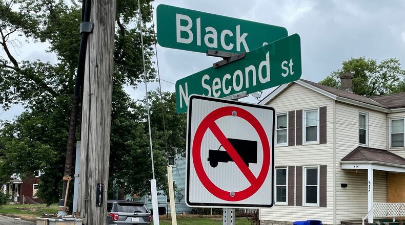 The city has purchased dozens of properties along North Second and North Third streets just off Black Street east of the Spooky Nook at Champion Mill. All of the properties recently purchased, and the ones the city purchased in the early 2000s for a different project, will be razed in order to construct a parking lot to support the Spooky Nook development. Pictured is 814 N. Second St., which was recently purchased by the city. MICHAEL D. PITMAN/STAFF