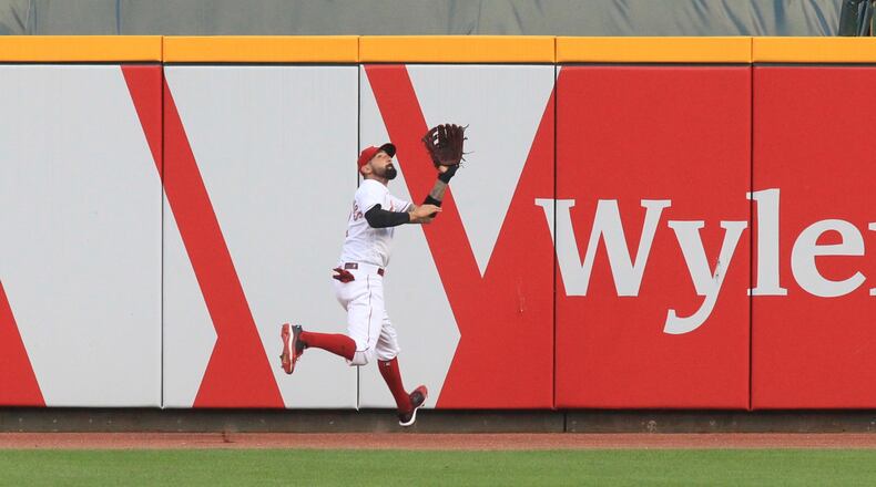 Reds right fielder Nick Castellanos makes a catch against the Royals on Tuesday, Aug. 11, 2020, at Great American Ball Park in Cincinnati. David Jablonski/Staff