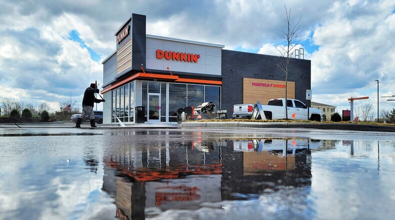 A Dunkin' opened last month in Fairfield and features two drive-through lanes and doubles windows to make service faster and more effective, officials said. The restaurant is holding its grand opening at 10 a.m. Thursday. NICK GRAHAM/STAFF