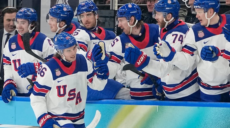 United States' Jack Hughes (86) celebrates after scoring his side's third goal during a men's ice hockey semifinal game between the United States and Slovakia at the 2026 Winter Olympics, in Milan, Italy, Friday, Feb. 20, 2026. (AP Photo/Hassan Ammar)