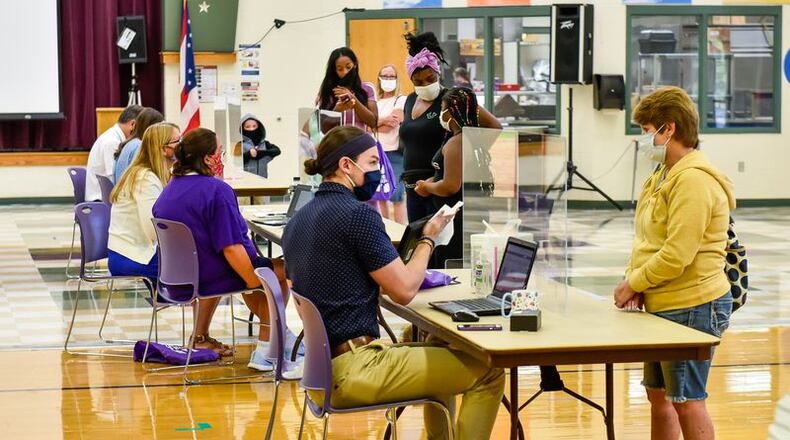 For the first time an area school district is trying to raise money through a public donation campaign to pay for wifi for students from needy families. Middletown Schools officials announced the campaign this week and hope to cover the costs for the district's low-income families with school-age children. Earlier the district handed out laptops (pictured) to families. (File Photo\Journal-News)