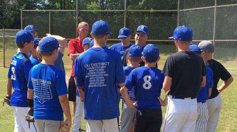 Hamilton West Side coach Tim Nichting talks to his team before a Sunday practice session at the Hoover Community Recreation Complex in North Canton. West Side lost to Galion 10-3 on Saturday in the first round of the Ohio Little League Tournament and will face Kenton on Monday night. RICK CASSANO/STAFF