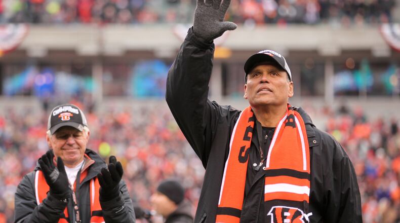 Cincinnati Bengals Hall-of-Famer Anthony Munoz, right, was honored along with the 1982 Freezer Bowl team before the NFL playoff game on Sunday, Jan. 5, 2013, at Paul Brown Stadium in Cincinnati, Ohio. Kareem Elgazzar | WCPO Cincinnati