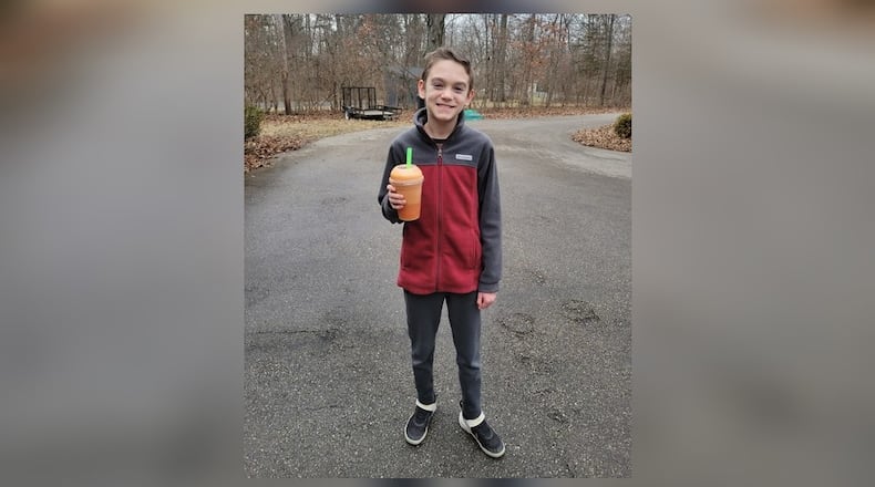 Twelve-year-old Miles Dumyahn enjoys a Smoothie from MOON Co-Op in Oxford. CONTRIBUTED
