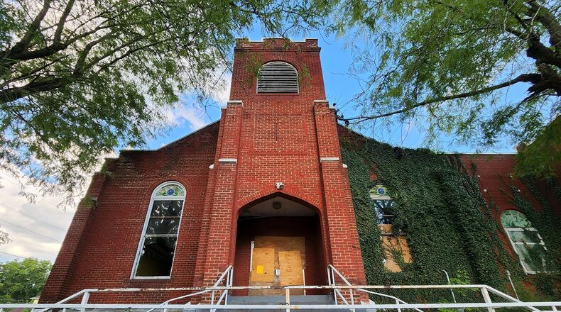 The Butler County Land Bank is starting to award $500,000 in state demolition money to down eyesores. The largest so far is an estimated $92,000 to down the old Power of Deliverance Temple in Middletown. NICK GRAHAM/STAFF
