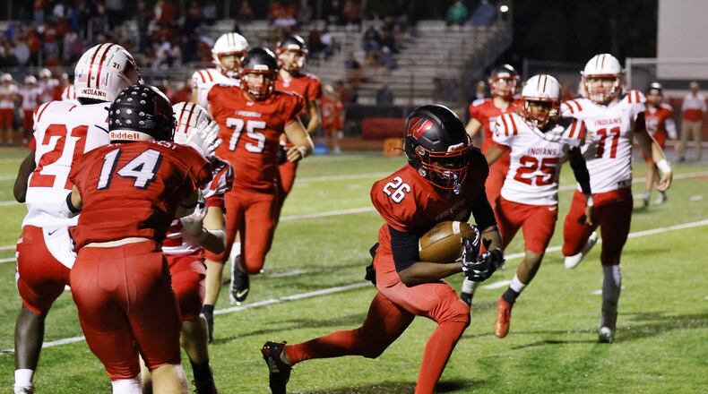 Jiovionni Wilson of Lakota West looks for room to run against Fairfield at West on Oct. 1, 2021. Nick Graham/STAFF