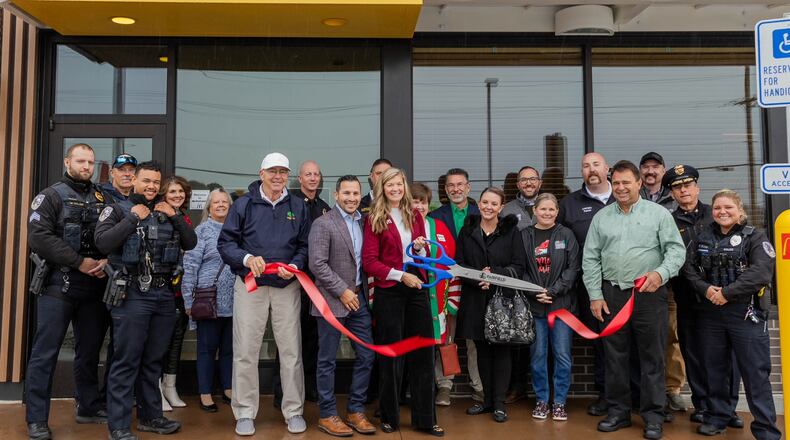 Community members and local officials joined together for the ribbon cutting of Fairfield’s new McDonald’s on Dec. 18. The new restaurant is located at 2866 Menard’s Blvd., Fairfield Twp. The restaurant is owned and operated by Derrick and Kara Tafur. CONTRIBUTED
