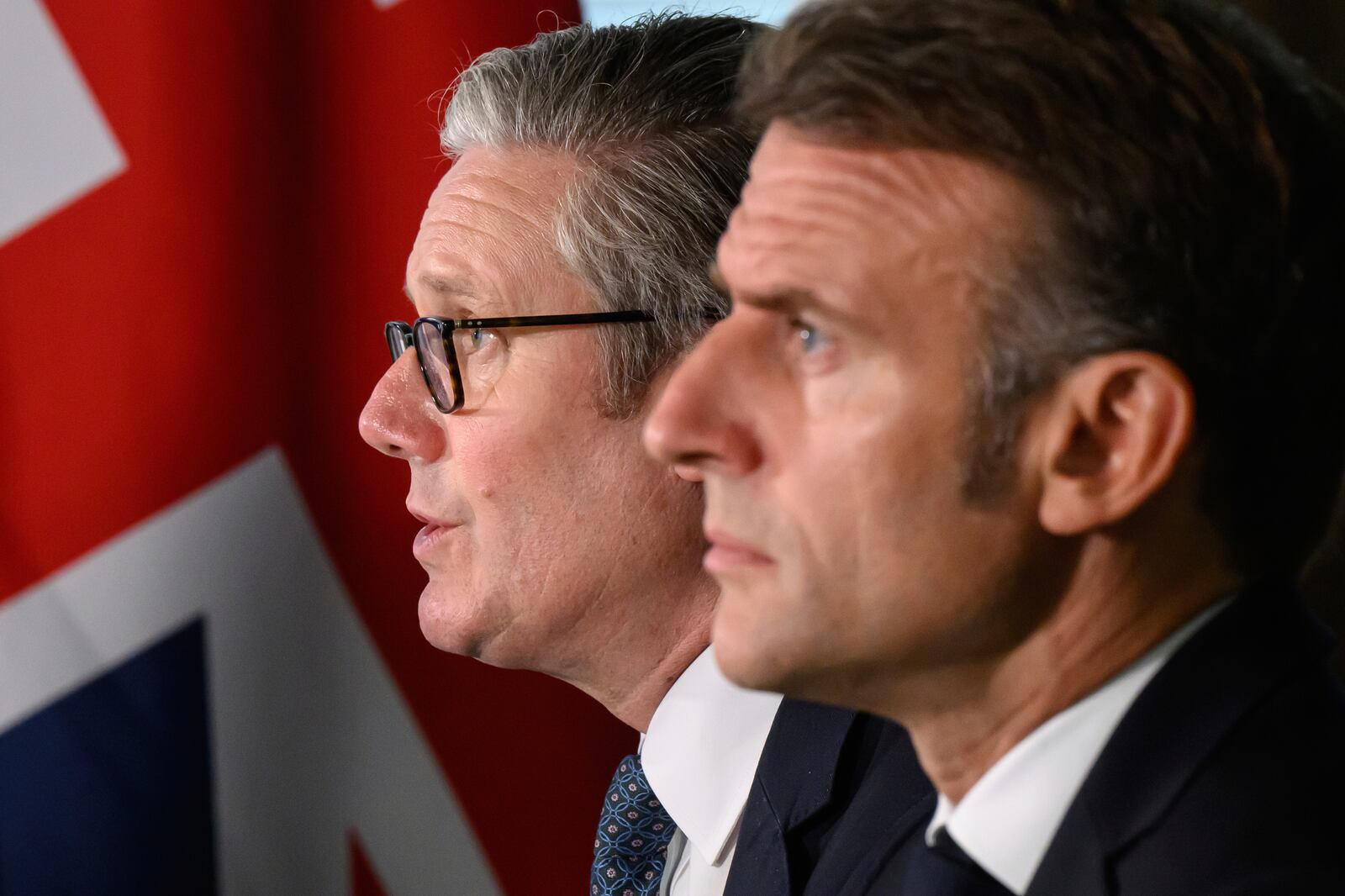 British Prime Minister Keir Starmer, left, and French President Emmanuel Macron, host a meeting of the Coalition of the Willing during a joint military visit to the Northwood Headquarters, in London, Thursday July 10, 2025. (Leon Neal/Pool Photo via AP)