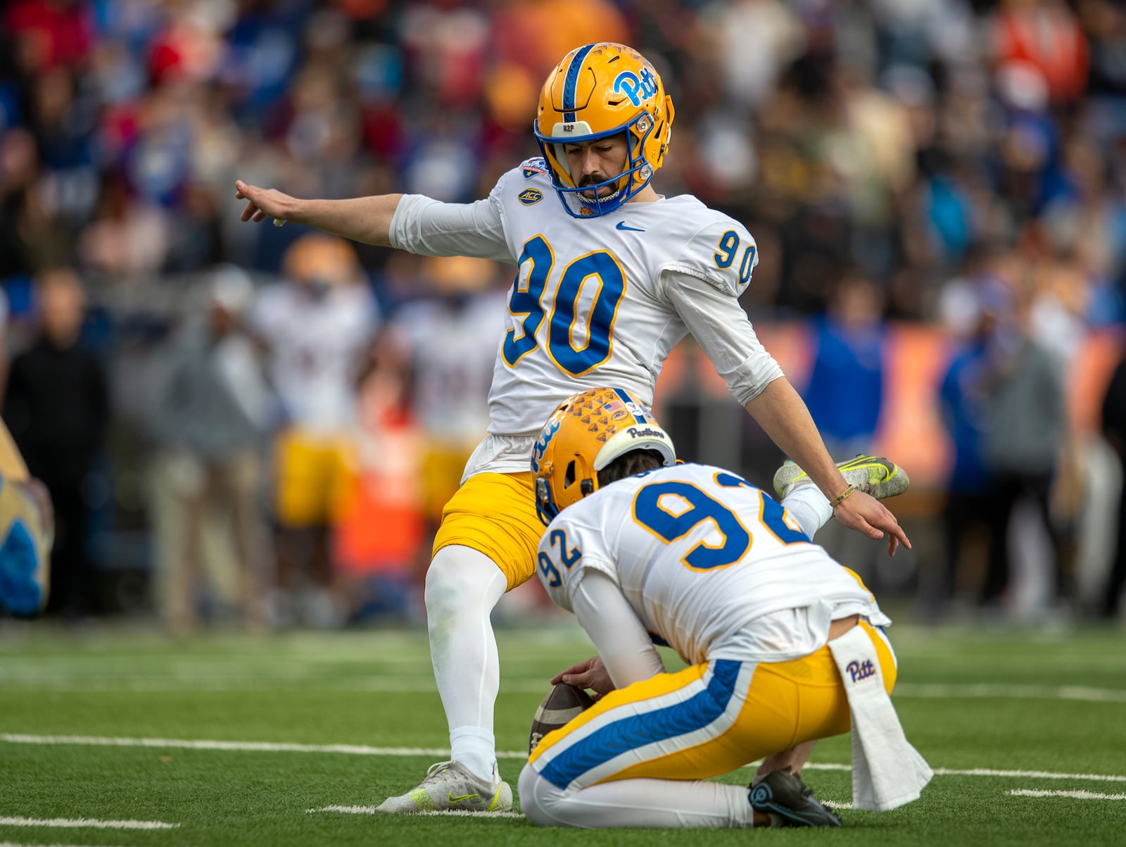 FILE - Pittsburgh place-kicker Ben Sauls (90) kicks the game-winning field goal during the second half of the Sun Bowl NCAA college football game against UCLA, Friday, Dec. 30, 2022 in El Paso, Texas. Sauls returns to the Panthers after ranking among the Bowl Subdivision leaders with 20 field goals last year. (AP Photo/Andres Leighton, File)