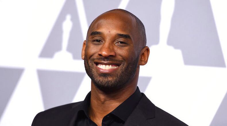 Kobe Bryant arrives at a luncheon for Oscar nominees in The Beverly Hilton on Money February 5, 2018 in Beverly Hills, California. (Photo by Jordan Strauss/Invision/AP)