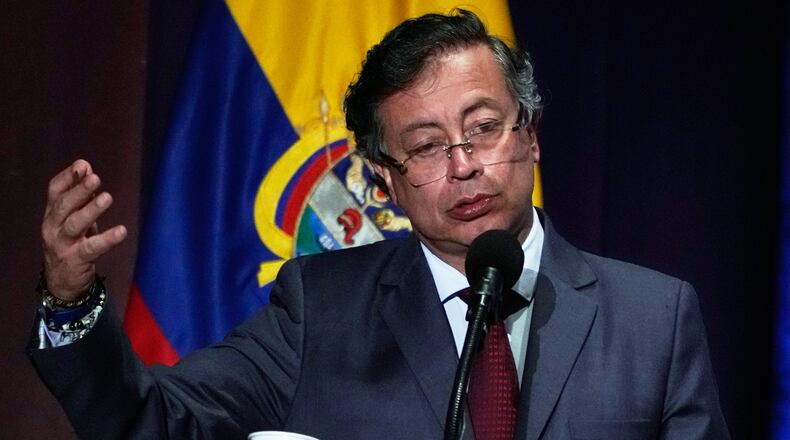 Colombia's President Gustavo Petro speaks at a ceremony marking the ninth anniversary of the signing of a peace deal between the state and the Revolutionary Armed Forces of Colombia (FARC), in Bogota, Colombia, Wednesday, Nov. 26, 2025. (AP Photo/Fernando Vergara)