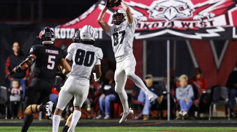 Lakota East's PJ MacFarlane catches a pass during their football game against Lakota West Friday, Oct. 18, 2024 at Lakota West High School in West Chester Township. NICK GRAHAM/STAFF